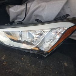 2013-2015 Hyundai Santa Fe headlight - left OEM
