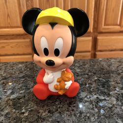 Vintage Disney Baby Mickey Mouse Soft Rubber Squeaky Toy holding a Teddy Bear.  Size 5 inches tall.  Preowned.  Nice edition to any Disney Mickey Mous