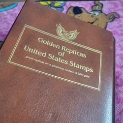 Golden Replica Of US Stamps Binder W/17 Stamps