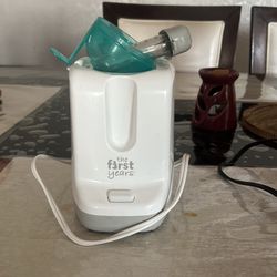 The First Year Bottle Warmer 