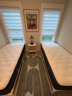 bed frame , lamp, nightstand, rug