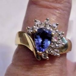 18k. Solid gold Tanzanite and very clean diamond ring