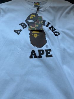 Two Bape Tees small looking for essential shorts