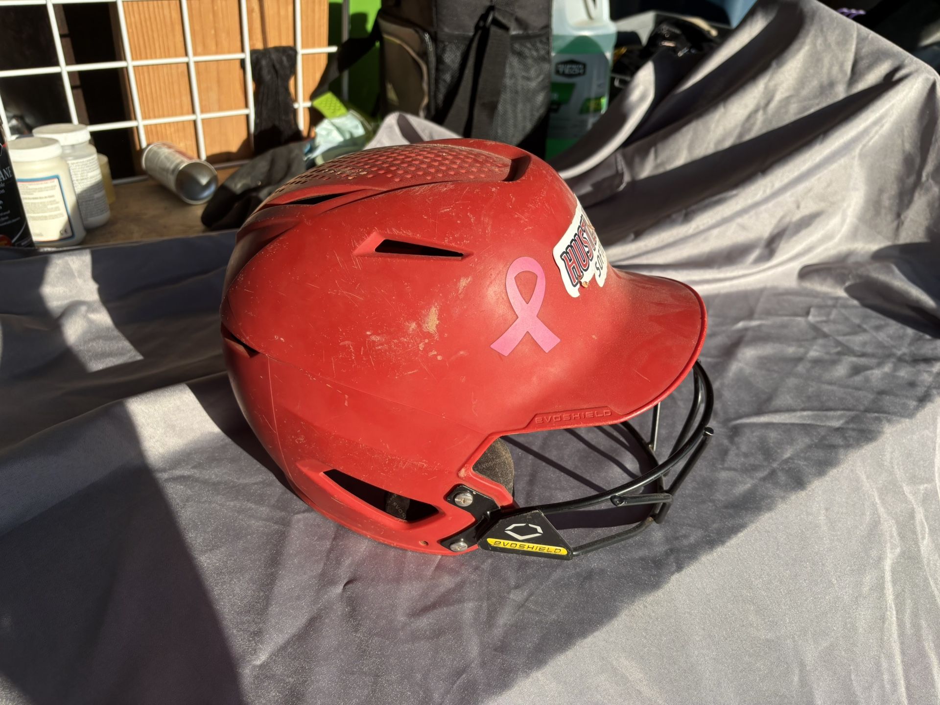 Red softball helmet