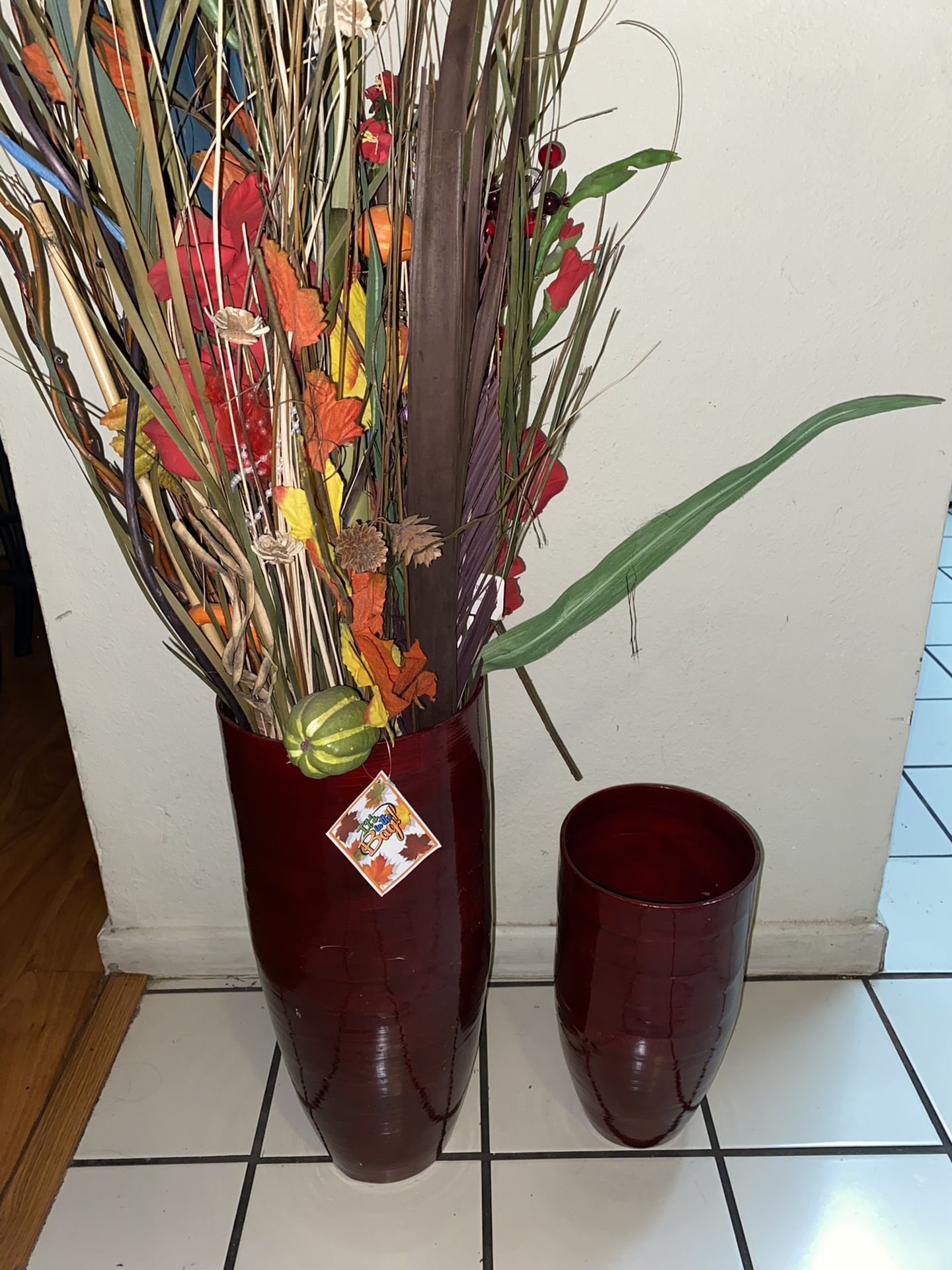 A set of Two decorated wood vases