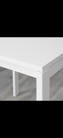 White table with two chair chairs