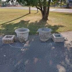 Two Concrete Planters And Square Stands 