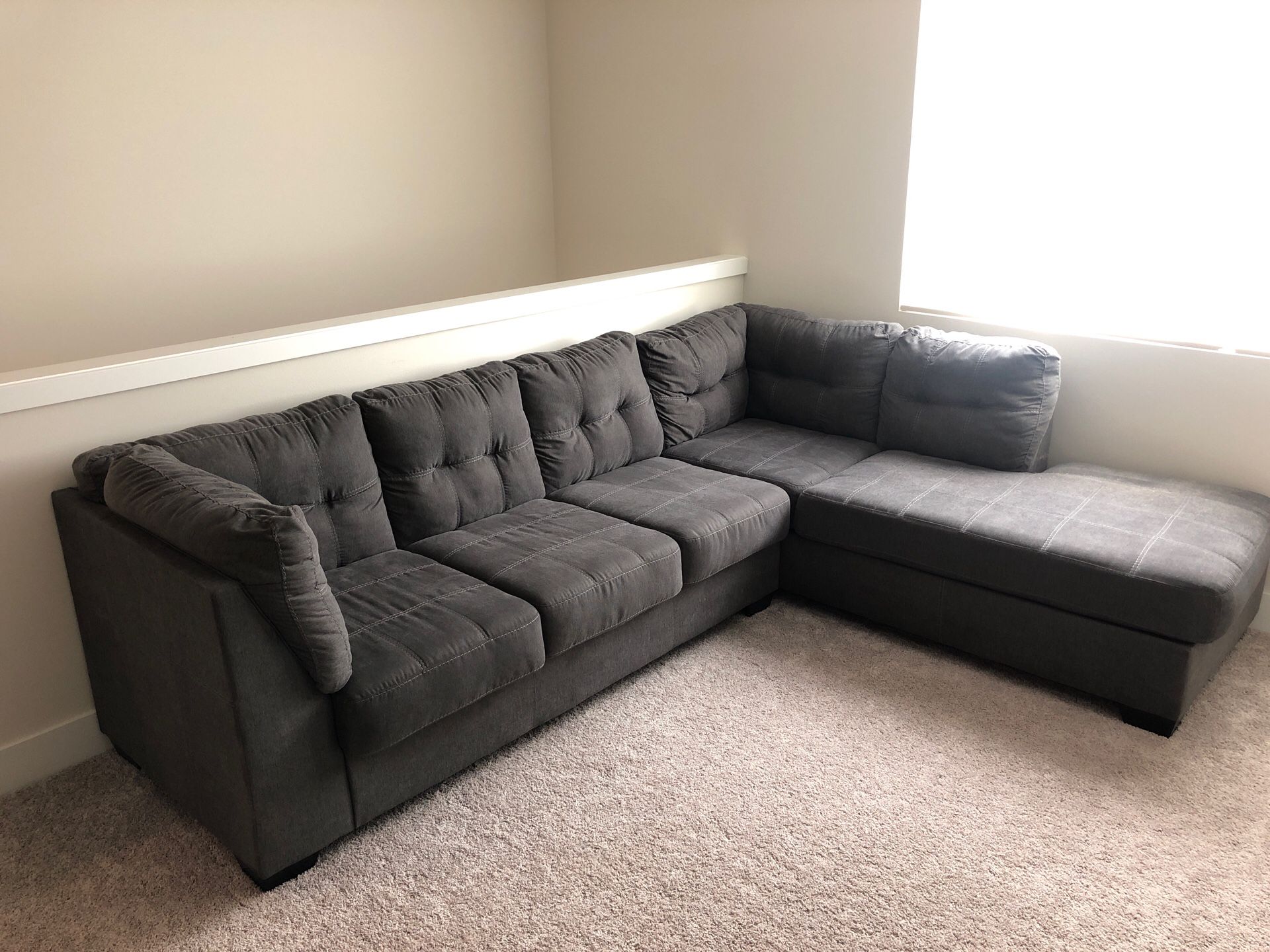 Large used gray sectional couch