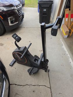 Rowing exercise machine