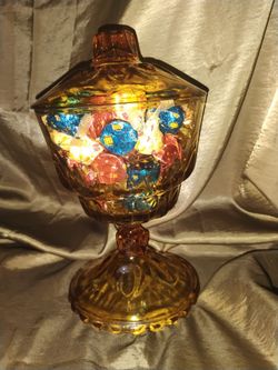 Amber colored glass candy dish
