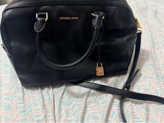 Black pebbled leather style Micheal Kors bag