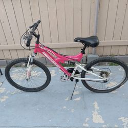 Mongoose XR-75 24-inch 21-speed full suspension mountain bike.
