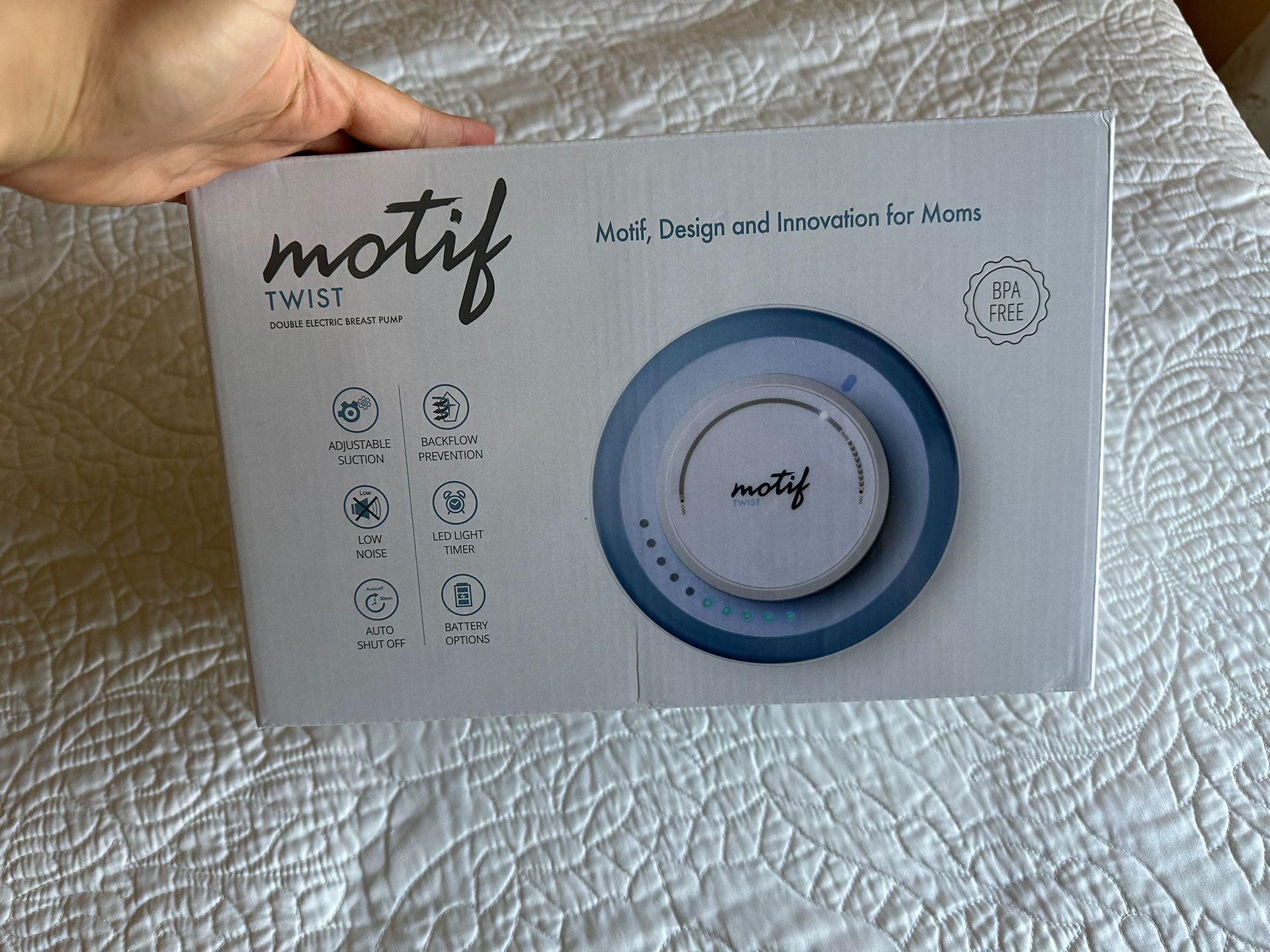 Motif twist breast pump