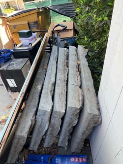 8 very heavy 3ft by 4ft concrete slabs plus 3 odd ends