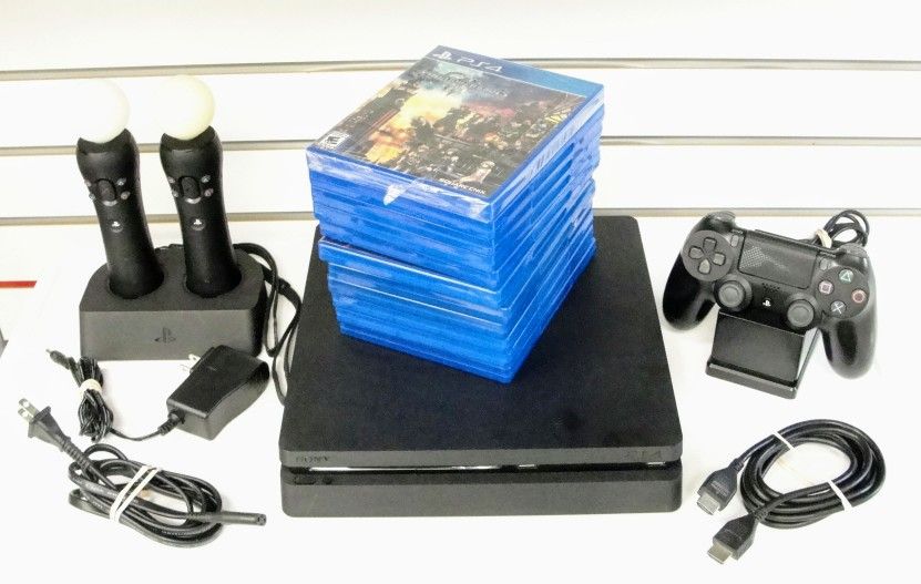 SONY PS4 SLIM WITH ELEVEN GAMES & STAND