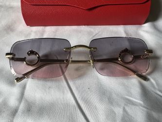 Pink/purple iridescent Cartier glasses