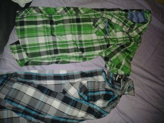 New boys dress shirts. Large-x large. 10 a piece. Or both for 17.00 only worn 1 time each. Paid at least 20 per shirt.