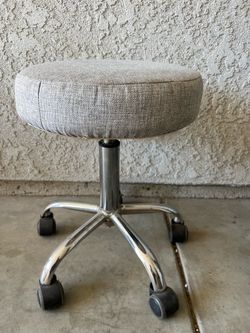 Rolling Stool with Gray Fabric Seat