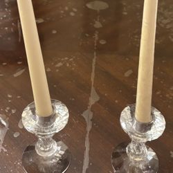 Candlestick holder with candles.