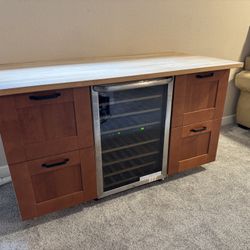 Bar with wine fridge and drawers 
