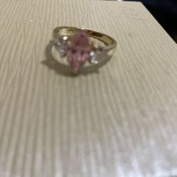 Marquise Cut Pink Ice Stone With Cubic Stones On Either Side In  A Gold Tone Setting Size 8