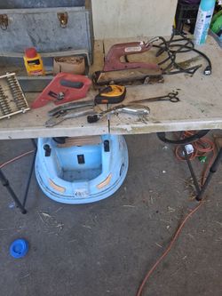 Roberts seaming iron and hand tools
