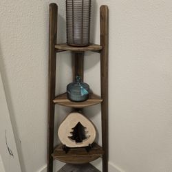 wooden standing shelf with decor
