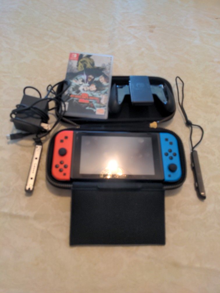Nintendo Switch Plus One Game Used Excellent Working Condition.