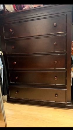 2 brown solid wood dressers