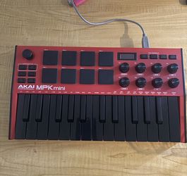 Akai professional mpk mini black and red pre owned Fair condition