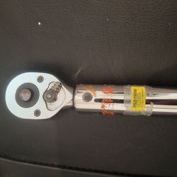 micrometer click-style torque wrench. 