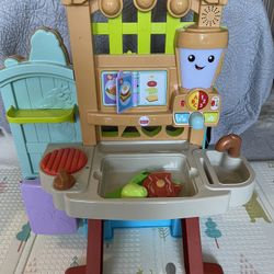 Fisher-Price Laugh & Learn Grow-the-Fun Garden to Kitchen