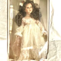 Vintage new in the box 18 inch tall, collectors choice, genuine, fine bisque porcelain doll with with certificate