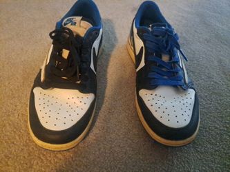 Cactus Jack Nike Air Jordan 1 Low SneakersFragment x Travis Scott colorway.