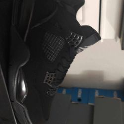 Black Cat Jordan 4s 