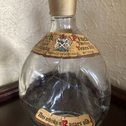 Vintage Haig and Haig Scotland Whiskey Bottle with Lid and Wire. Cash only/ no shipping.