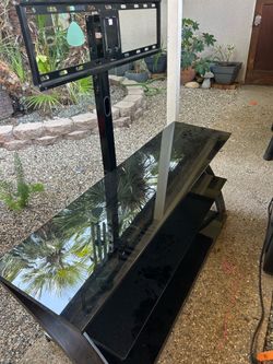 Three shelf glass top TV stand