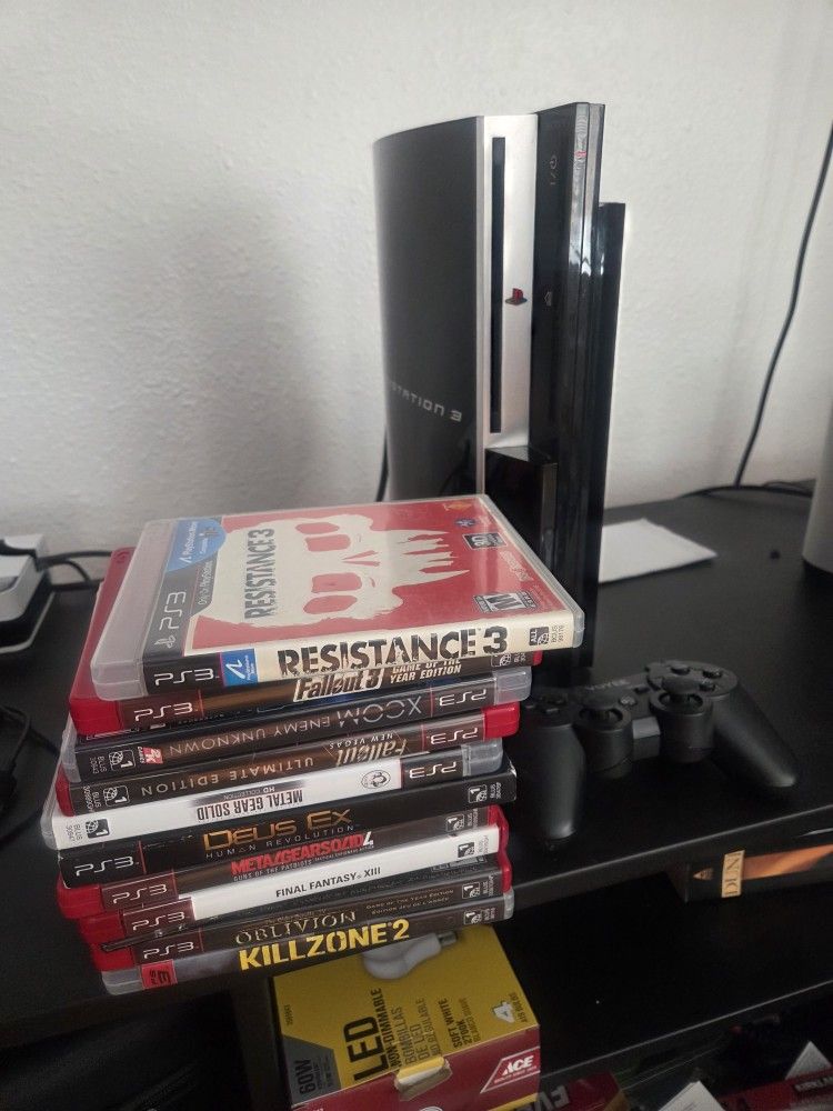 Ps3 With 2 Controllers And 8 games