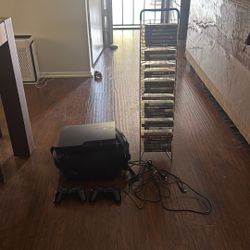 PS3 With Games, 2 Controllers And Cords