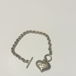 Rare vintage Tiffany and co sterling silver puff heart bracelet.