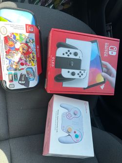 NINTENDO SWITCH OLED + JOYPAD + CASE