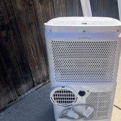 Air Conditioner Cools with Dehumidifier 
