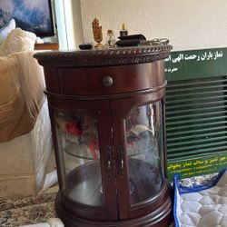 Side table with cupboard for decorations