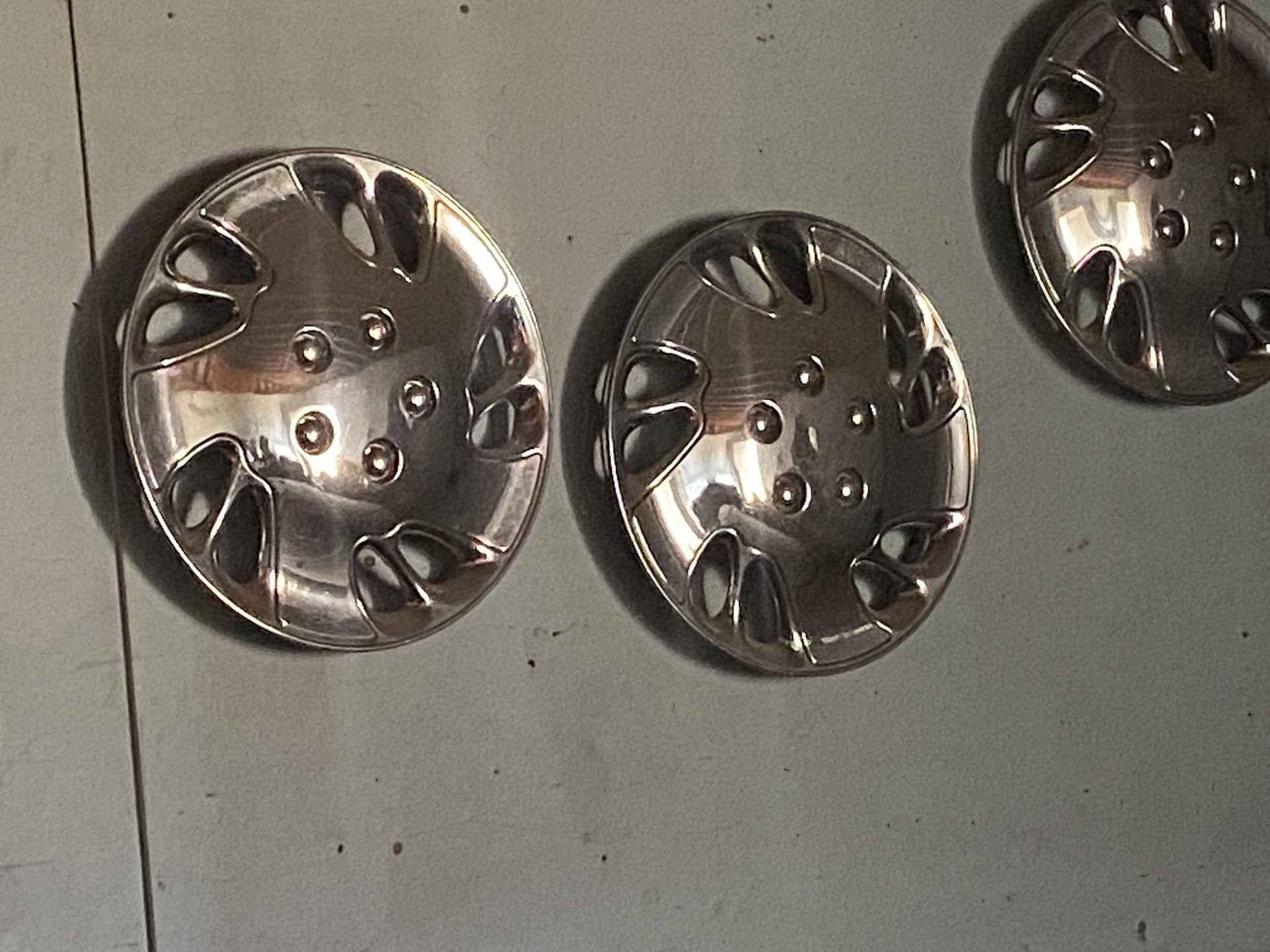 Four Hubcaps