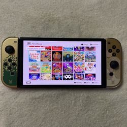NINTENDO SWITCH OLED + 120 SWITCH GAMES