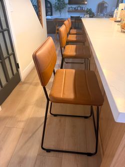 Brown leather counter height barstools