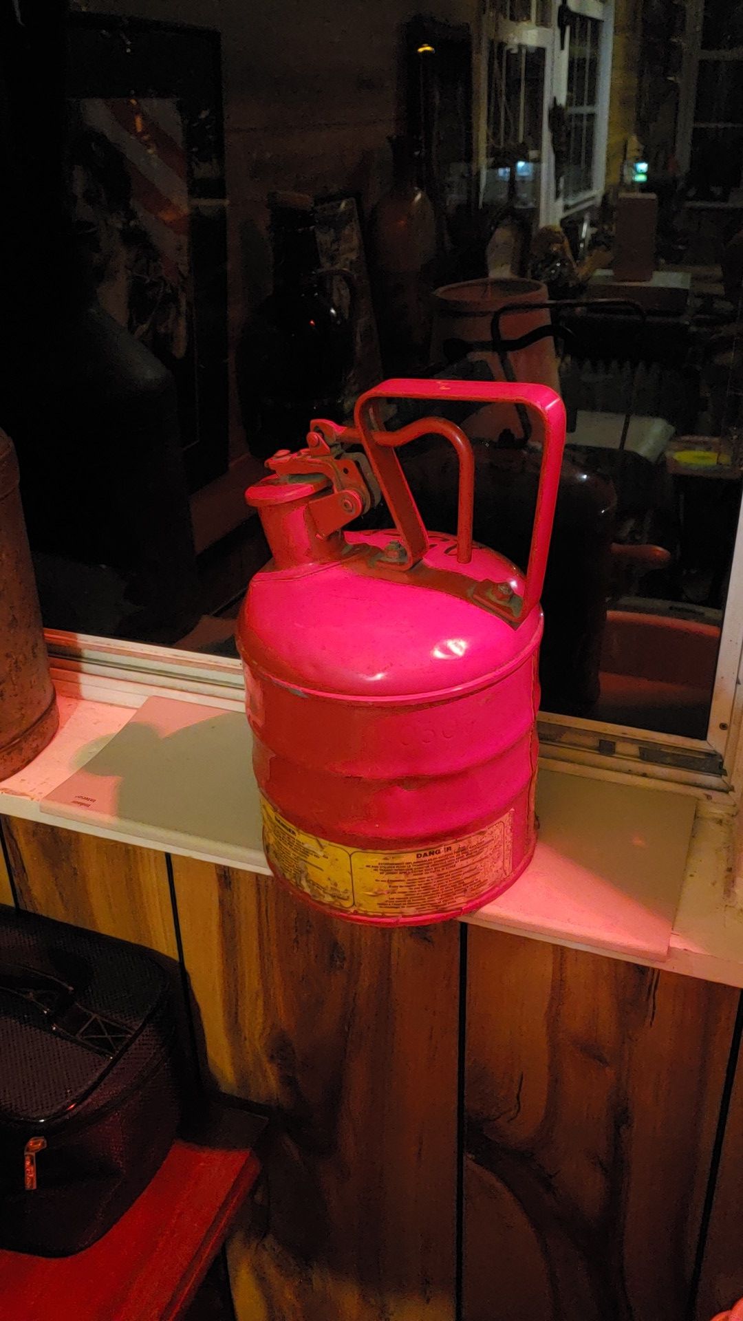 Gasoline container and old brown crown bottle