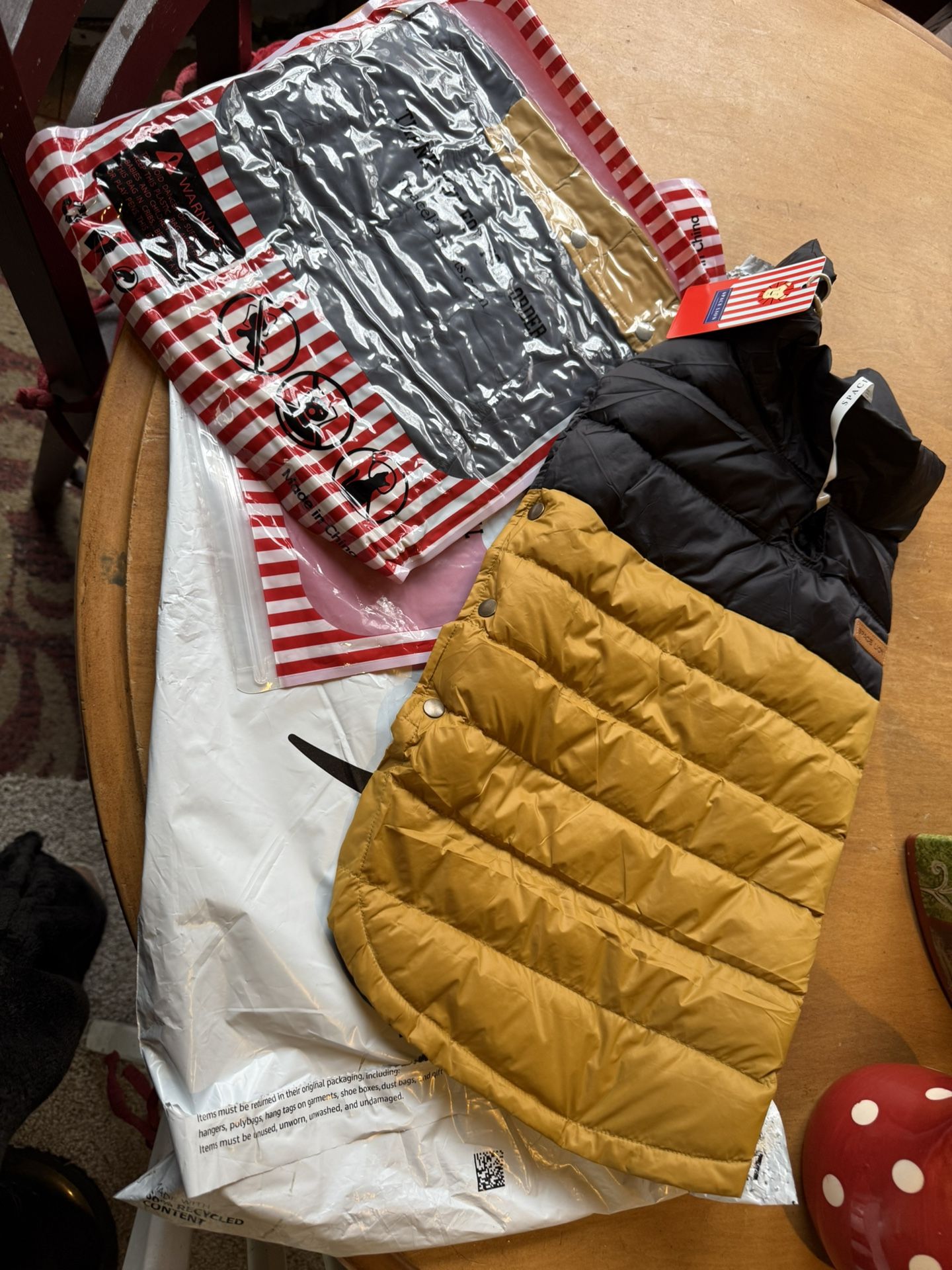 2 new dog coats. Bought on Amazon too small for my dogs. 16” from collar to butt. Only $10 for both. Rochester wa. 