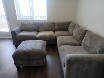 Gray Corduroy Sectional Sofa with Ottoman