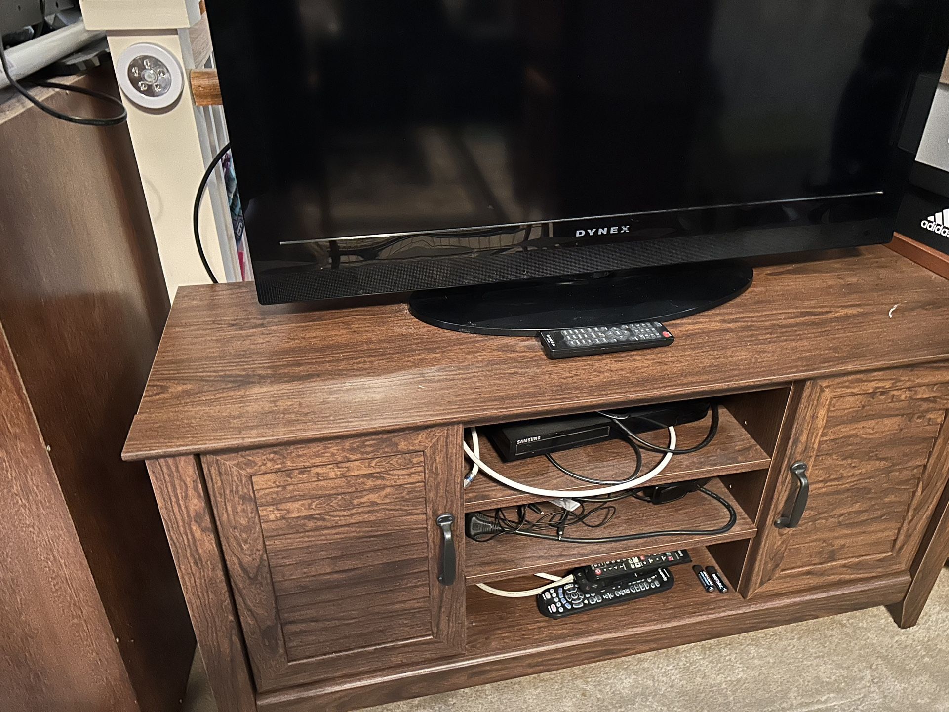 Nice Tv Stand And Tv With Remote